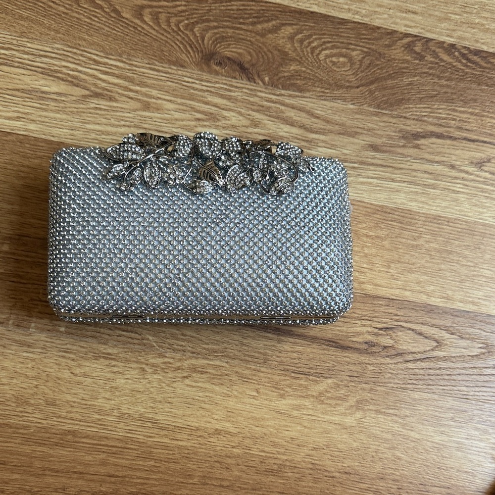 Chic Silver Clutch with Floral Detail